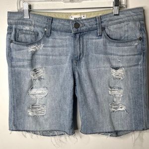 PAIGE Grant Destructed Light Wash Denim Shorts
